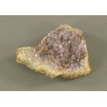 An amethyst geode section. 10.5 cm long.