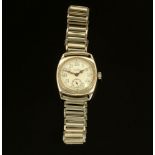 A vintage JW Benson silver cased gentleman's wristwatch, with stainless steel bracelet,