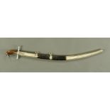 An important early 19th century Egyptian cavalry sabre, with horn grip and white metal hilt,