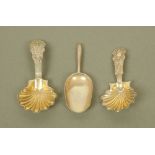 Two similar 19th century continental (possibly French) white metal caddy spoons,