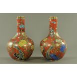 A pair of 19th century Chinese cloisonne enamel bottle shaped vases,