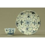 An 18th century Chinese blue and white tea bowl, and a Teksing treasure small plate.