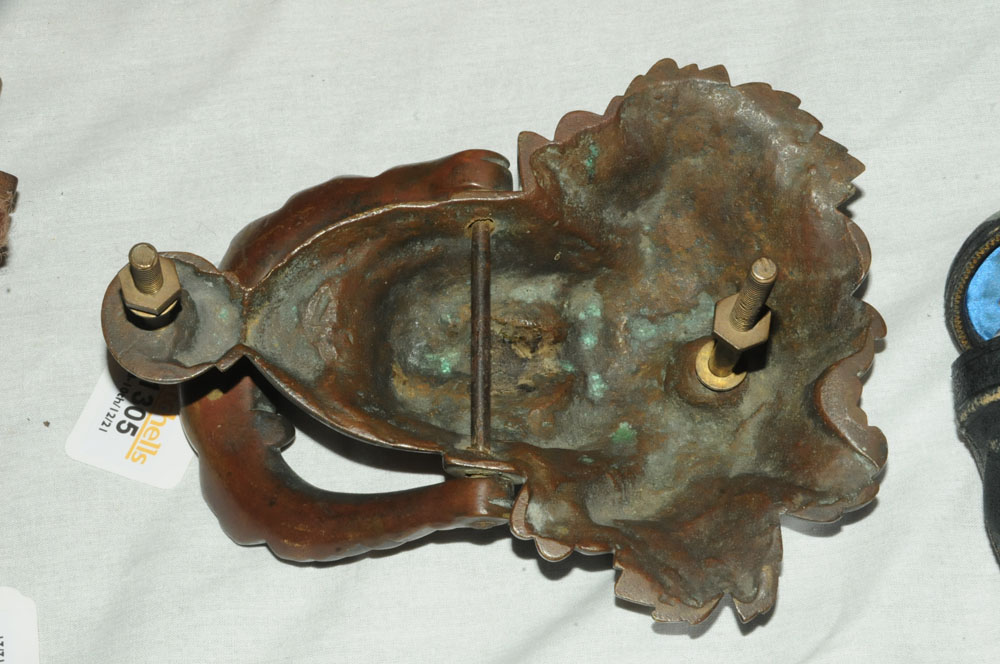 A Victorian bronze door knocker, in the form of a female face. Height 19 cm, width 14 cm. - Image 4 of 4