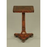 A Victorian figured rosewood pedestal occasional table,