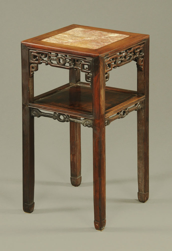 A Chinese hardwood rouge marble topped jardiniere stand with shelf.