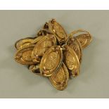 A set of fourteen George III ormolu furniture handles,