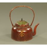 A late 19th century Chinese wooden teapot, with loop handle, painted and with beetle to lid.