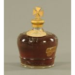 A crown shaped glass bottle of port with mitre stopper, to commemorate Coronation 1937,