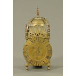 A reproduction brass lantern clock by Thomas Moore Ipswich. Height 38 cm, dial diameter 17 cm.