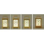 A collection of four brass carriage clocks, three timepieces only, one with alarm.