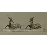 An Art Deco deer group, spelter, raised on a marble plinth. Length 48 cm.