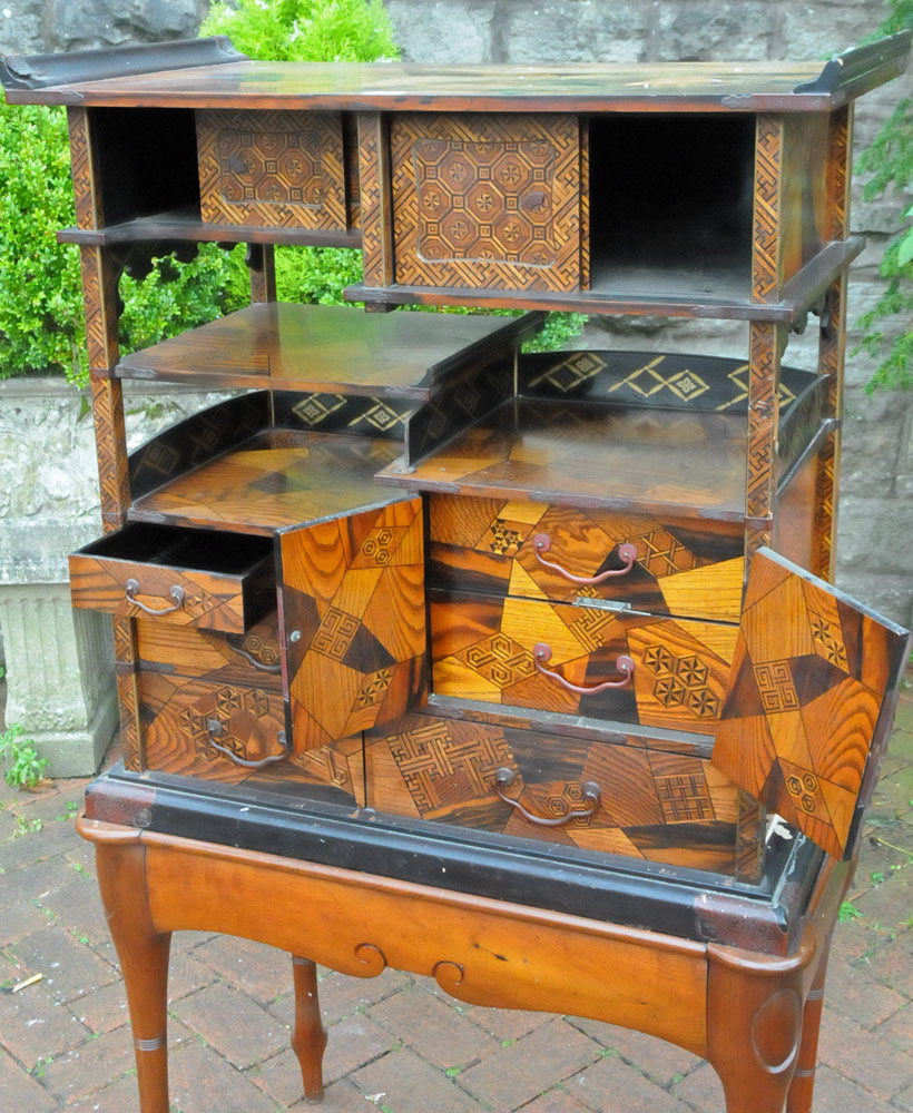 A Japanese parquetry and lacquered tabletop cabinet, raised on a later stand. - Image 6 of 15