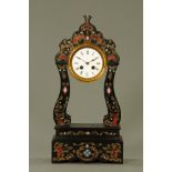 A late 19th century French ebonised and Boulle work mantle clock of rococo design,