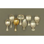 Eight George III silver caddy spoons by Josiah Snatt, displaying different patterns and styles,