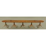 A mahogany five pillar extending dining table of Regency design,