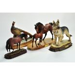 A well presented group of ceramic horse, pheasant and alsation related studies / sculptures, various