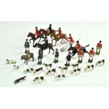 A group of mainly Lead Metal Britains Hunt Figures comprising mounted issues, hounds, fox and