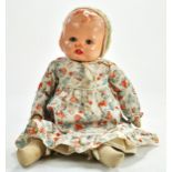 1930/40s 15”/38cm Baby Doll with composition head and cloth body. Painted face, with blue eyes and a