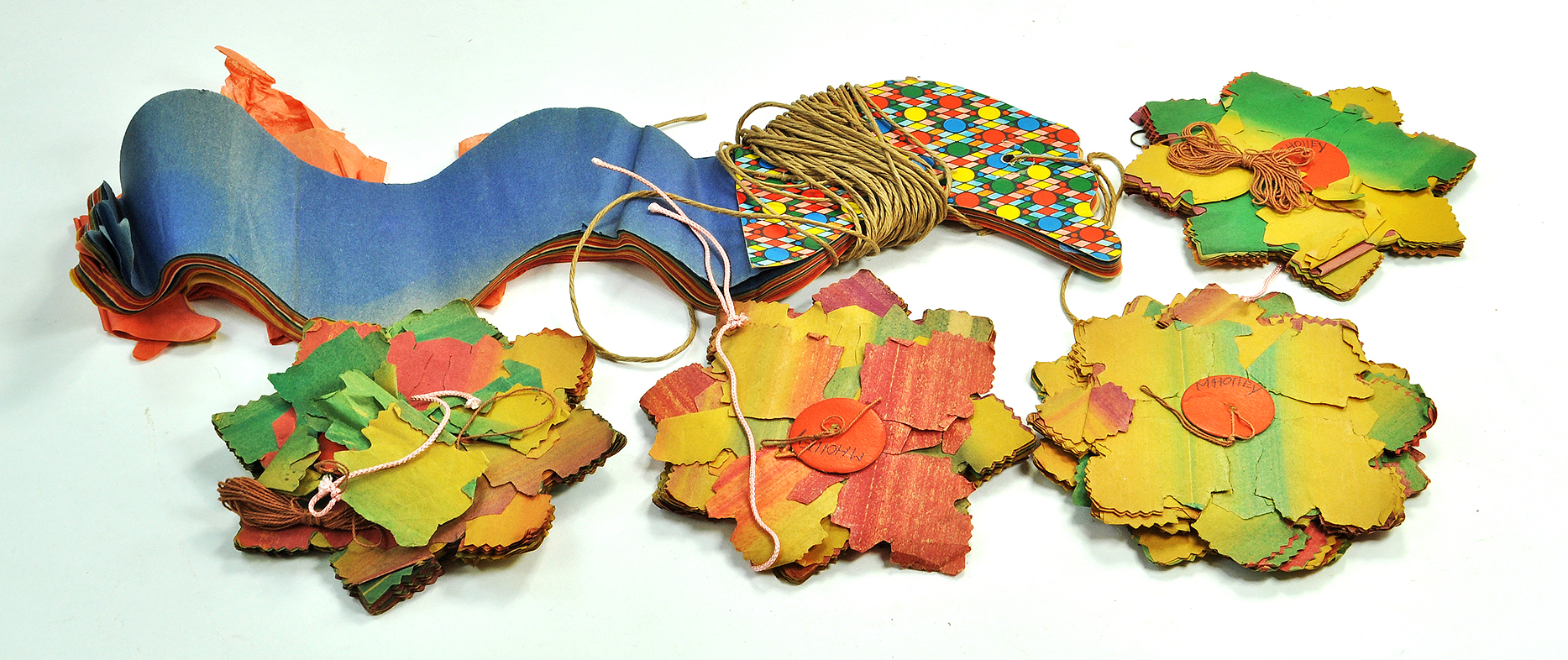 A scarce group of early 20th Century Christmas / Festive Garlands. Mostly complete, some minor