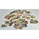 A large collection of vintage TOPPS trading cards comprising many dozen football issues in