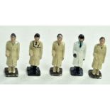 Hard to find group of miniature machine operator figures. Fair to Good.