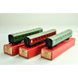 Hornby Dublo 00 Gauge model railway issues comprising Trio of coaches, No. 4081, 4063 and 4054. Look