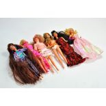 A group of 6 Vintage Barbie Dolls in various outfits and styles. Generally good.