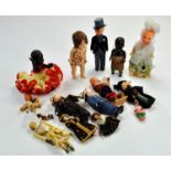 A Group of Vintage miniature dolls, in wood, composition and plastic including a Little Miss Rosebud