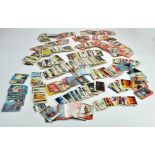 A large collection of vintage TOPPS trading cards comprising many dozen examples relating to