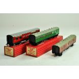 Hornby Dublo 00 Gauge model railway issues comprising Trio of coaches, No. 4049 and 4082 plus one