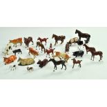 A group of lead metal farm animals comprising mostly horses and cow figures. Makers include