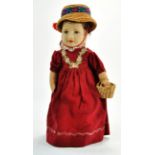 Vintage Felt Masked 15” Doll wearing handmade red dress with braid, straw bonnet and carrying a