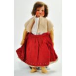 Bisque and composition jointed Doll with a Bisque head, plump painted face with blue glass eyes,