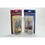 Lord of the Rings LOTR collectables comprising duo of carded figures. Appear unopened.