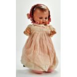 Antique 14”/36cm German Hermann Steiner Baby doll. Bisque moulded head, painted hair with blue