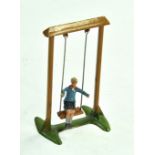 Britains No. 619 early lead metal issue comprising Boy seated on Swing. Well preserved example