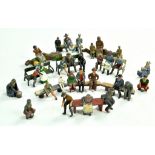 A large and interesting group of mostly seated lead metal figures, inclusive of various makers