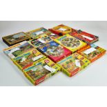 An assortment of vintage jigsaw puzzles, some dating over 70 years old. Vendor kindly advises by