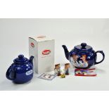 Wade Tetley Tea group comprising boxed figures with badge plus duo of teapots. Appear excellent.