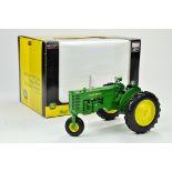 Spec Cast 1/16 John Deere MT Gas Tricycle Tractor. Has been on display but appears excellent with