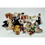 An assortment of mostly older issue dolls and related items including toy gun / holster combination,
