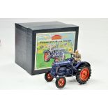 Britains 1/32 Farm issue comprising Vintage Series Fordson E27N Tractor with Figure. Appears