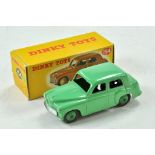 Dinky No. 154 Hillman Minx. Pale green body with green hubs 'Hillman Minx' visible on underside of