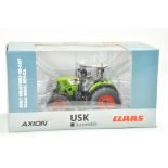 USK Scale Models 1/32 Farm issue comprising Claas Axion 850 Tractor. Excellent, secured in box,