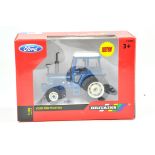 Britains 1/32 Farm issue comprising Ford 7600 Tractor. Note Wheel Conversion. Previously on display,