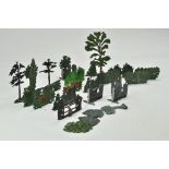 A group of lead metal miniature trees from various makers including Britains. Some well preserved,