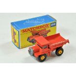 Matchbox Regular wheels No. 28d Mack Dump Truck. Orange with unpainted base, blue tinted windows,