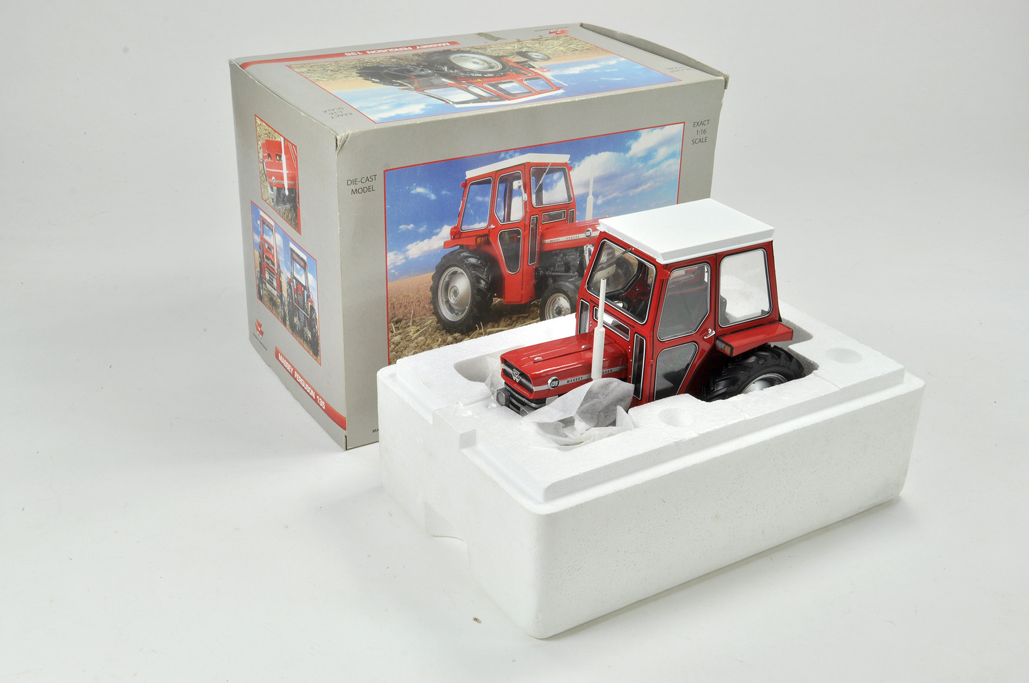 Universal Hobbies 1/16 Farm issue comprising Massey Ferguson 135 Tractor with Cab. Model appears