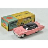 Corgi No. 214M Ford Thunderbird Hardtop with flywheel motor (works well). Pink body with black roof.