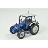 Universal Hobbies 1/32 Ford 6610 Series II 4WD Tractor with custom wheels. Excellent.